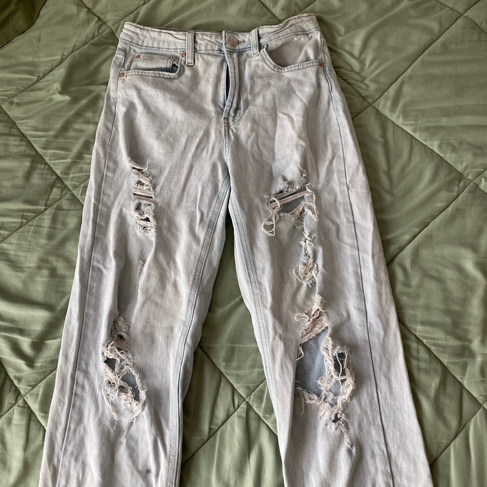 Light blue ripped jeans